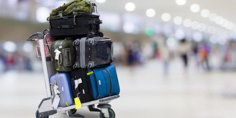 During air travel, one of the major concerns for passengers is baggage preparation. A lot of travelers constantly have one question on their minds ‘How Many Bags Can You Check In Airlines?’ The answer depends on many factors, such as cabin class, the airline’s policies, flight routes, destinations, and loyalty program status. These elements directly affect the number of checked baggage items a traveler can carry and whether it will be complimentary or payable. To gain valuable insights into checked luggage allowances, consult this manual for comprehensive information. From the quantity of bags to the weight and size restrictions, travelers will learn everything in just a single read. Also, you will get to know the baggage guidelines of various airlines operating worldwide. Keep browsing. What Is Checked Baggage Allowance? Passengers often get confused between the terms cabin luggage and checked baggage. Well, in simple words, cabin bags are what you carry with you inside the aircraft, the ones you get to store in front of the seats or in the overhead bins. On the other hand, checked luggage is not permitted in the cabin and will be stored in the aircraft's cargo hold. Flyers must submit checked bags at the check-in counters, and they will be collected at the luggage claim area upon arrival at their destination. Generally, most airlines follow two systems for checked baggage allowances: the piece concept and the weight concept. As per the piece concept, passengers are allowed to carry a specific number of bags weighing a certain limit. Under the weight system, travelers may bring as many bags as they wish, provided the total weight does not exceed the airline’s baggage allowance. How Many Checked Bags Are Allowed In Economy Class? The checked baggage guidelines for economy class vary by airline and route network. As economy coaches are inexpensive, the number of belongings permitted may be lower than in premium cabins. In basic economy, many airlines do not allow even one checked bag for free, and passengers must pay a fee. Travelers who book a standard economy flight are usually permitted one piece of checked luggage at no additional cost. When it comes to international flights, the rules may differ. Many full-service airlines may permit one complimentary piece of luggage for flyers. However, if the overseas travel includes a long-haul flight, the baggage limit for a passenger may be up to 2, which is often required, as passengers may want to bring many items to the destination. While different airlines have separate guidelines for checked baggage, there is a basic limit that is followed by most air carriers worldwide. The weight of the bag is generally expected to be around 23 kg (50 lbs), and the standard size limit is 62 linear inches (158 cm total dimensions). How Many Checked Bags Are Allowed In Premium Cabin Class? In premium cabins, such as business and first class, travelers are usually offered more baggage than in economy cabins. Why? Because of the higher fare prices and enhanced comfort levels. Passengers traveling in business class could easily bring up to two checked bags, without paying a single penny. When it comes to first class, some airlines allow passengers to take 2 bags, while others allow 3. So, always check the baggage rules of your operating airline. The weight limit for bags in luxury cabins is also higher than that in economy cabins. Most airlines will accept baggage weighing around 32 kg (70 lbs). Not just that, one can benefit from faster luggage handling and other priority services, which will make their travel experience a lot more worth it. So, if you travel often, premium cabins can be your ideal choice, as they offer more advantages than economy cabins. Understanding The Checked Baggage Guidelines Of Different Airlines Here is a list of baggage allowances for some U.S. airlines and international carriers. With this, you will get an idea of the rules and regulations that different airlines follow for cargo hold luggage. Passengers will know the maximum number of bags they can check in before boarding, as well as the size and weight limits. So, keep exploring. Airlines/ Checked Baggage Allowances Economy Cabin Premium CabinUnited Airlines In the standard and premium economy of United Airlines, the weight limit of the bags should not exceed 23 kgs (50 pounds). Passengers traveling in business class can bring two bags, each not exceeding 32 kg (70 pounds).EmiratesRegardless of the destination, travelers can carry as many bags as they want, with a total weight of up to 35 kg. Emirates allows business-class passengers to bring baggage up to 40 kgs. The weight limit is 50 kg in the first class. Delta Air LinesDelta Air Lines does not offer a free checked bag on domestic routes. On international routes, travelers might bring the first bag free of cost. The weight limit is 23 kgs (50lbs).Travelers flying in premium cabins can surely bring two bags for free. Each bag should not weigh more than 32 kgs (70 lbs). Qatar AirwaysQatar Airways permits 23 kg (50 lbs) of checked baggage in economy class. Each passenger can bring two bags for free. Business-class passengers are allowed 2 bags, each weighing 32 kg (70lbs). Allegiant AirAllegiant Air operates a single-cabin setup. The airline does not include checked baggage in the base fare, so passengers will have to pay a fee for each bag they bring. The total weight and size should not exceed 23 kgs (50 lbs) and 203 centimeters, respectively.Southwest Airlines Southwest Airlines has a single cabin but offers different fares. Passengers can bring two bags, each weighing no more than 23 kg (50 pounds). The measurement of the bags should not exceed 62 inches in size (length + width + height). Regulations For Overweight And Oversized Baggage As you know, every airline has a limit on the baggage it allows travelers to bring on board. However, there are times when travelers may want to bring additional bags that might exceed the weight and size limits. That is why airlines have separate rules for overweight luggage (anything that exceeds the standard weight limits of 23 kg in economy and 32 kg in business) and oversized luggage (bags exceeding the general limit of 62 inches). However, for carrying overweight or oversized bags, passengers will have to pay an additional amount. The heavier the bag, the costlier the fees. The exact charges will depend on the airline. So, make sure to verify the details before planning to carry some extra bags with you. Also, please note that extremely heavy bags (between 70 lbs and 100 lbs) may be completely restricted for safety reasons. Is There Any Exception To The Checked Baggage Allowance? Wondering if there are any exceptions to the normal checked baggage guidelines? The answer is yes. While most airlines have standard regulations for checked baggage, there are certain allowances that permit passengers to bring extra baggage during air travel. Want to gain complete insights? Read on. Frequent Flyer Members: Many airlines offer special benefits to passengers who fly with them regularly. This includes extra free checked baggage and a waiver of excess baggage fees. Special Items: Certain items can be brought regardless of baggage weight. For instance, sports equipment, musical instruments, and mobility devices are not included in the standard baggage allowance by most airlines. Baby Items: If someone is traveling with a toddler or infant, they can bring items such as strollers and car seats. These belongings are usually free of charge. Military Personnel: Many airlines allow military personnel to carry additional checked bags, which usually will be complimentary. Also, one can carry bags with higher weight limits. Final Verdict: How Many Bags Can You Check In Airlines? In simple terms, there is no fixed answer to how many checked bags a passenger can carry on the journey. Each airline has different rules and regulations for baggage that travelers are allowed to bring in the cargo. Also, the guidelines will be completely different for those flying in economy and those traveling in premium cabins. Hence, it will be better to determine the number of bags permitted by contacting the specific airline directly. By learning the necessary information in advance, passengers will be able to avoid unnecessary charges at the airport and fly to their destination with peace of mind. Safe Travels! People May Also Ask How Many Bags Can You Check In Airline